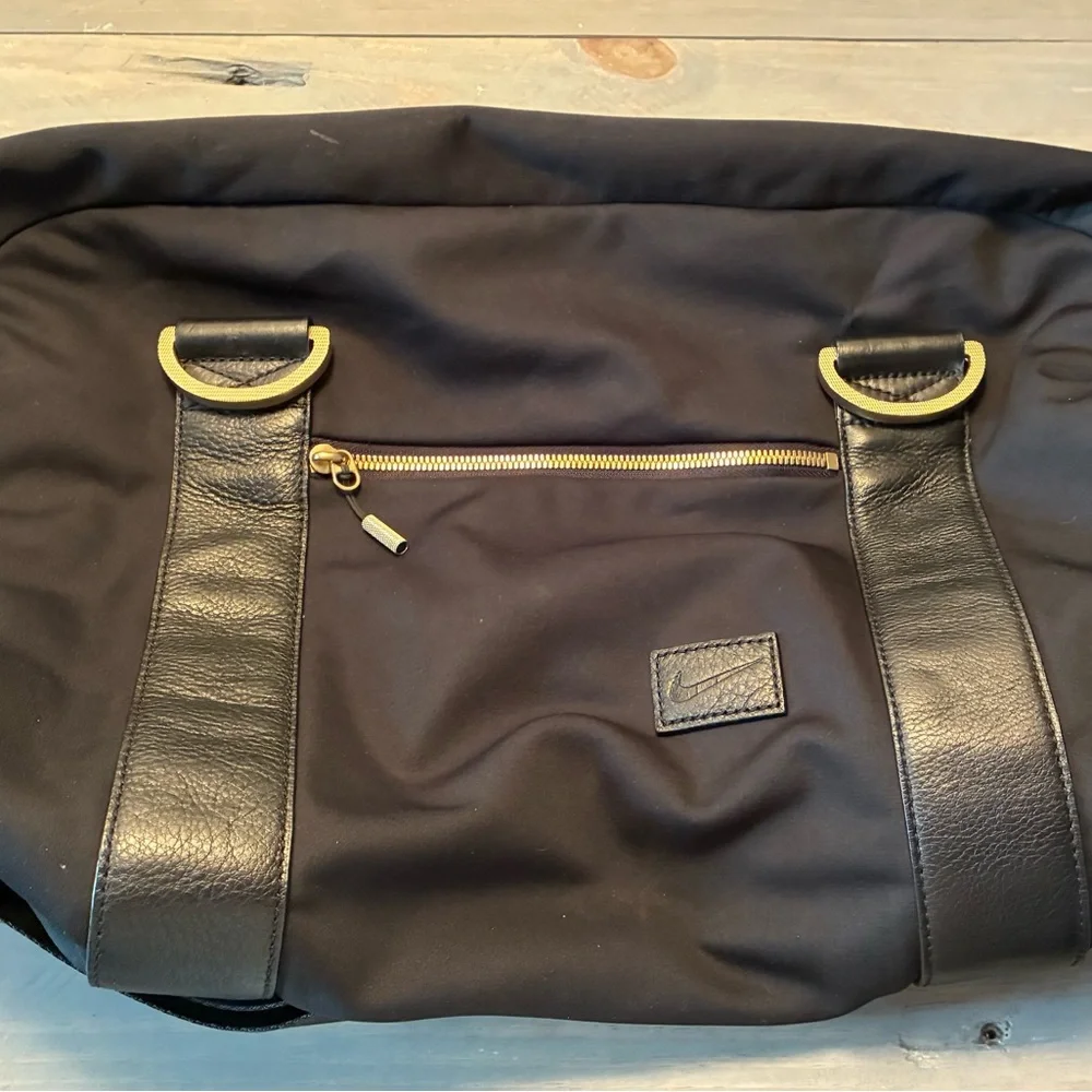 Black Men's Bag with Gold Accents